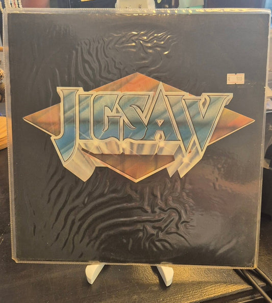 Jigsaw – Sky High & Other Hits - BØR BØRSONS BRUKTHANDEL